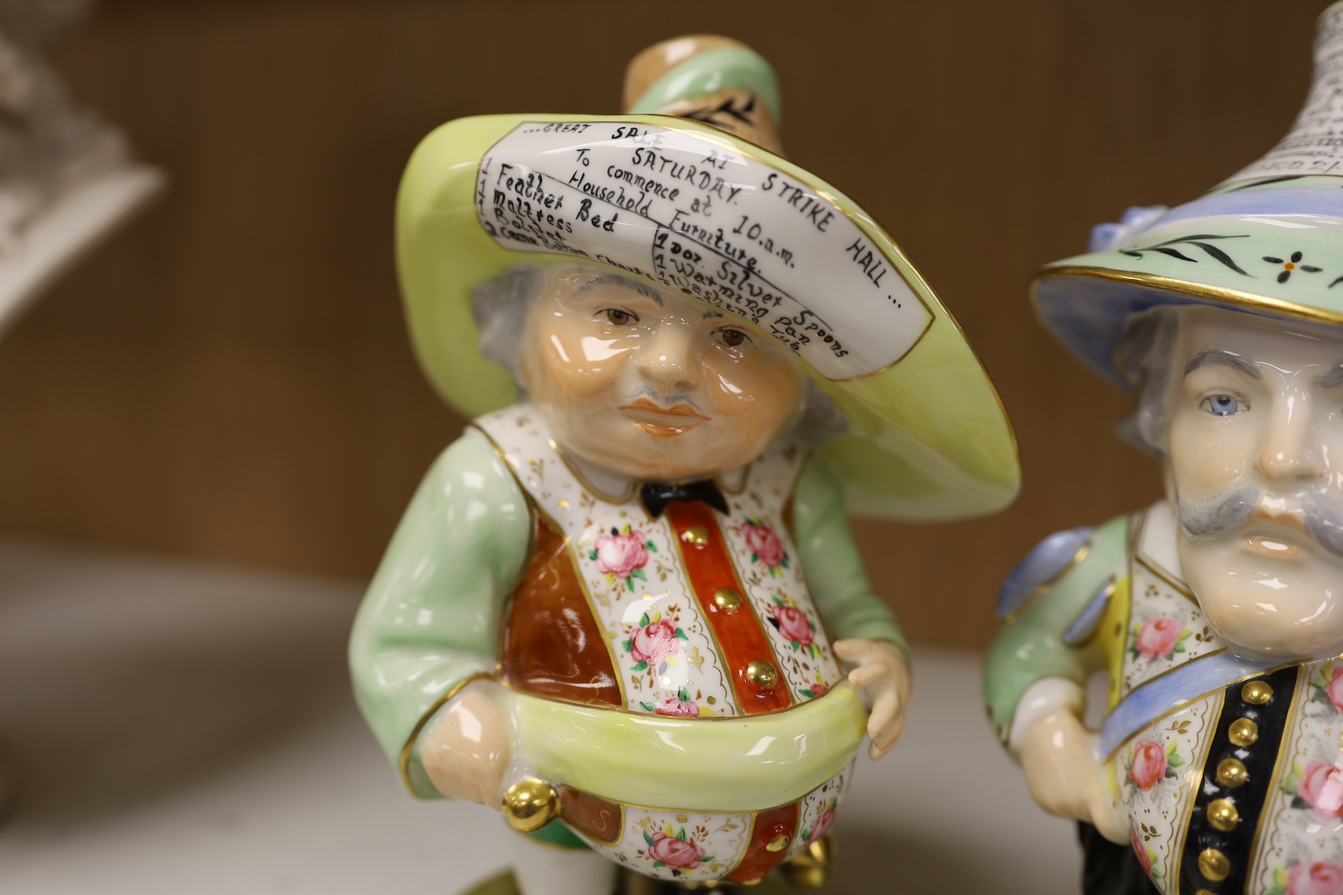 A pair of Derby Sampson Hancock Mansion House dwarves, late 19th century, tallest 18.5cm high. Condition - good